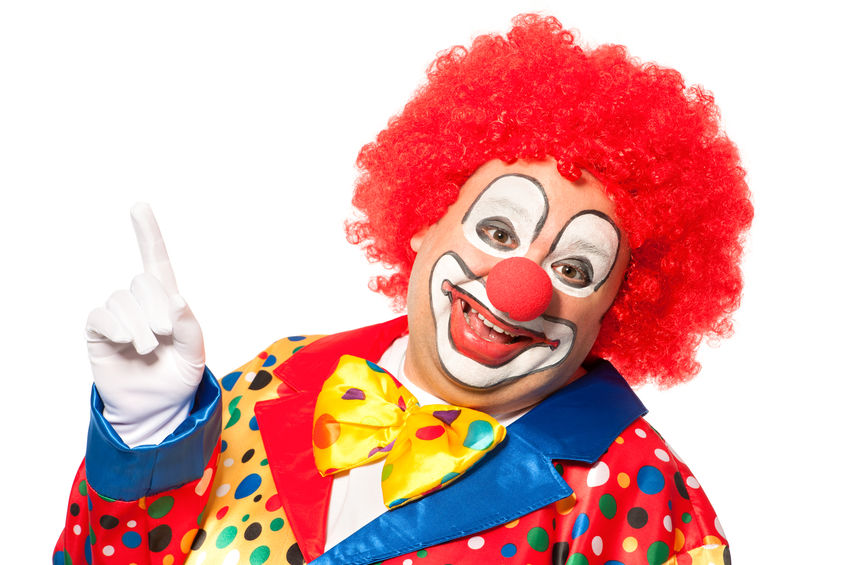 Portrait of a smiling clown isolated on white to promote laughter therapy with people living with dementia