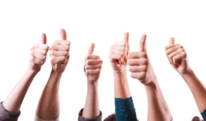 Thumbs up on white background