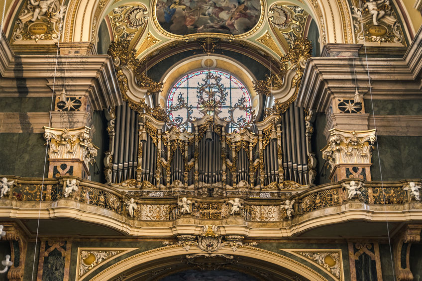 Brixen, Italy - Organ and choir loft above the entrance of the Cathedral of Santa Maria Assunta and San Cassiano in Bressanone.