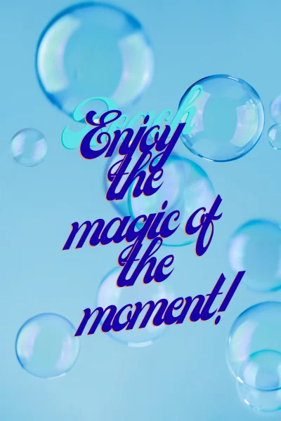 Blue background with bubbles has these words in purple as they relate to blowing bubbles together: "Enjoy the magic of the moment."