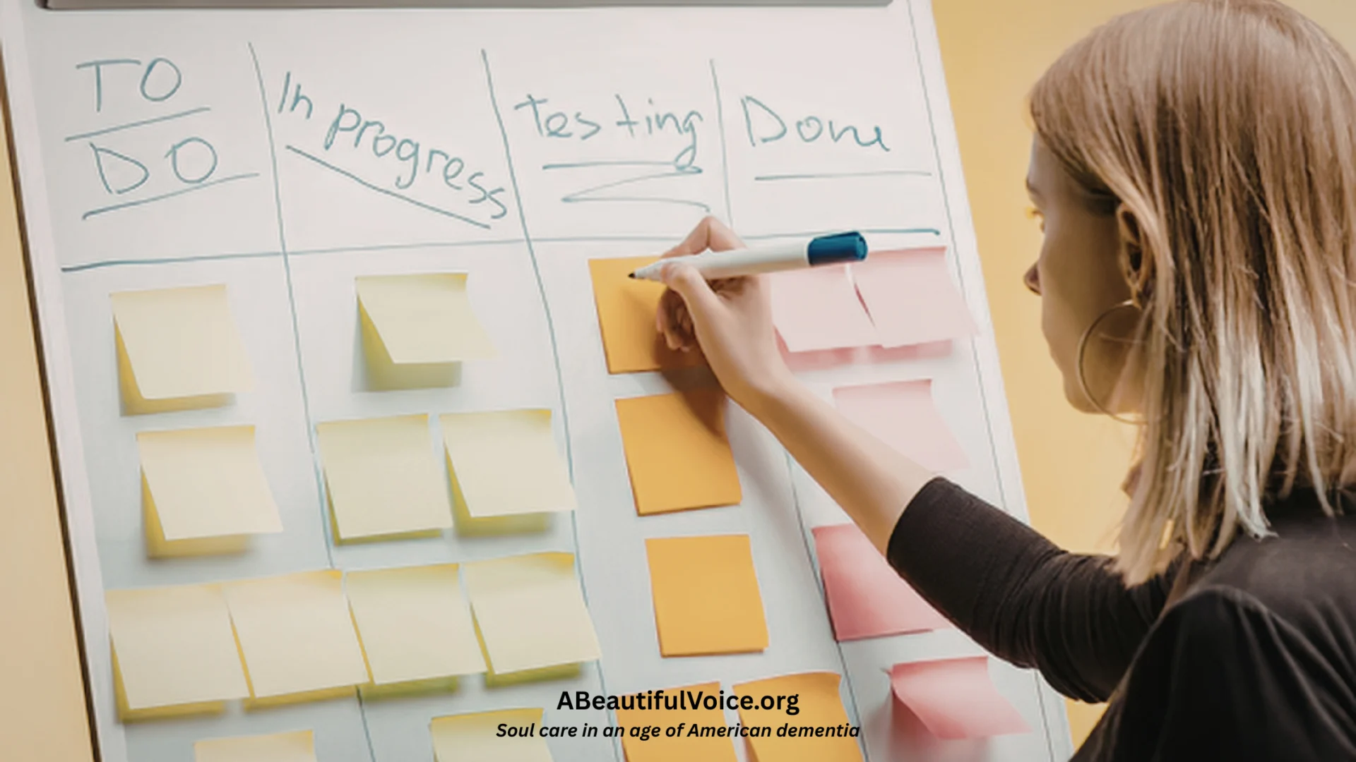 Dementia caregiver is organizing the board after brainstorming with the loved one their ideas for a Summer Bucket List.
