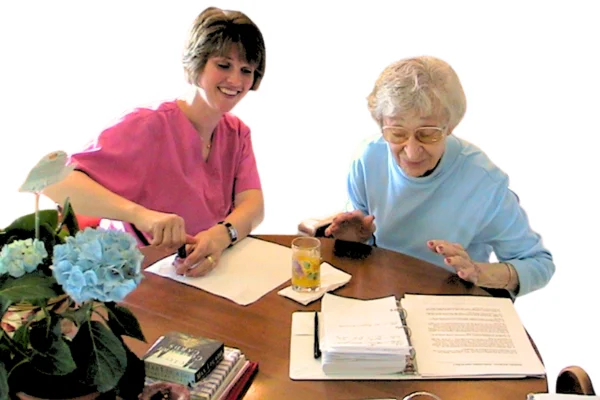 Trish provides manicure while Miss Ethel reads the latest entry to the Memory Journal.
